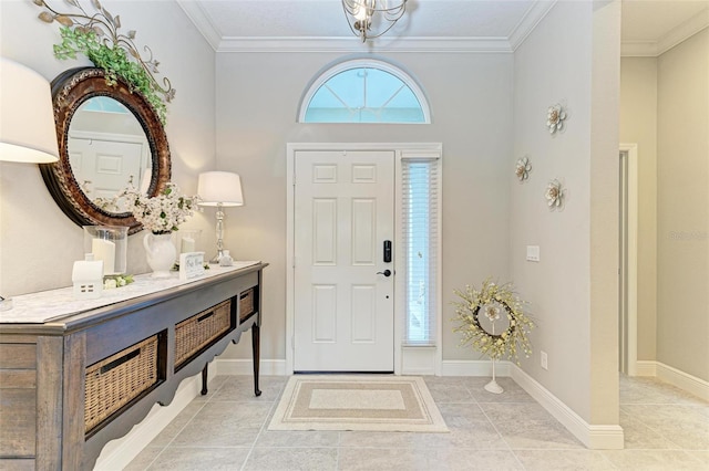 tiled foyer with ornamental molding