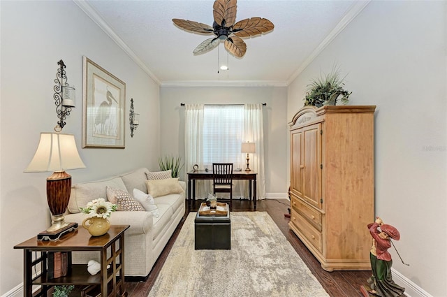 living room with crown molding, ceiling fan, and dark hardwood / wood-style floors