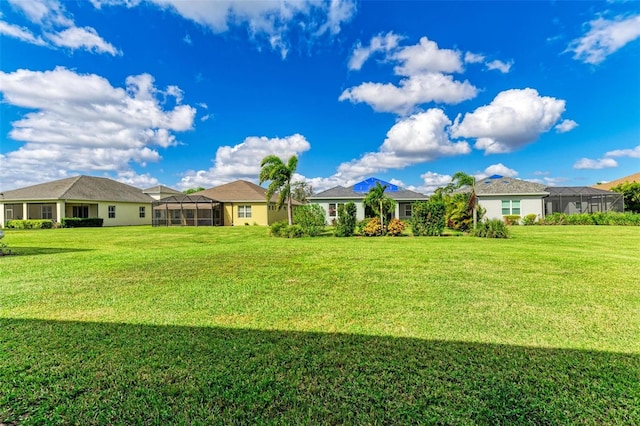 view of yard with a lanai