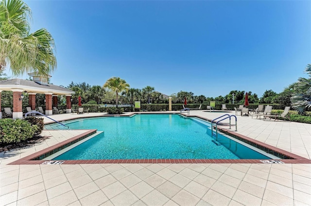 view of pool featuring a gazebo and a patio area