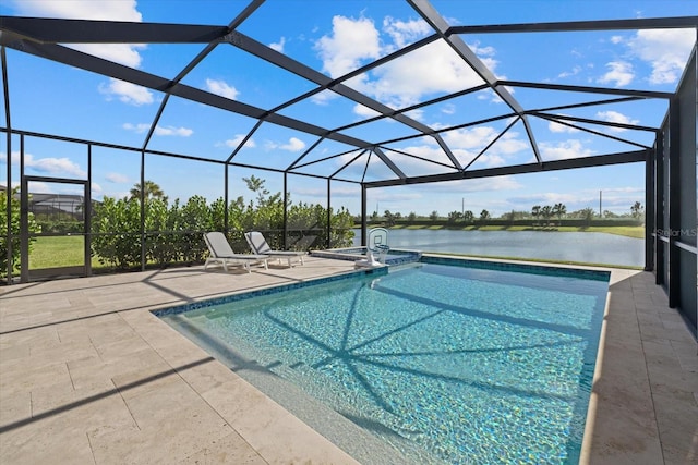 view of pool featuring a water view, a patio, and glass enclosure