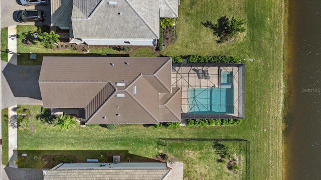 bird's eye view with a water view