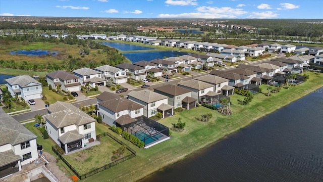 bird's eye view with a water view