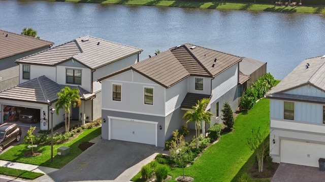 aerial view featuring a water view