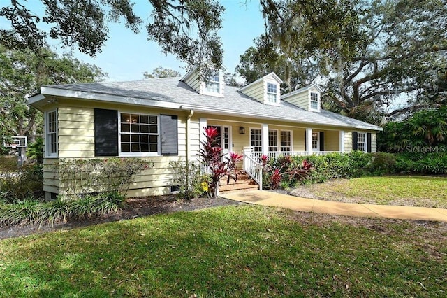 view of front of house featuring a front yard and a porch