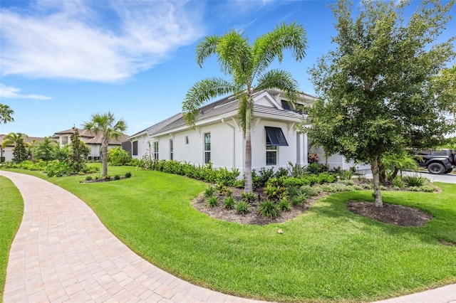 view of home's exterior featuring a lawn