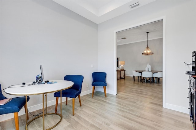 sitting room with light hardwood / wood-style flooring