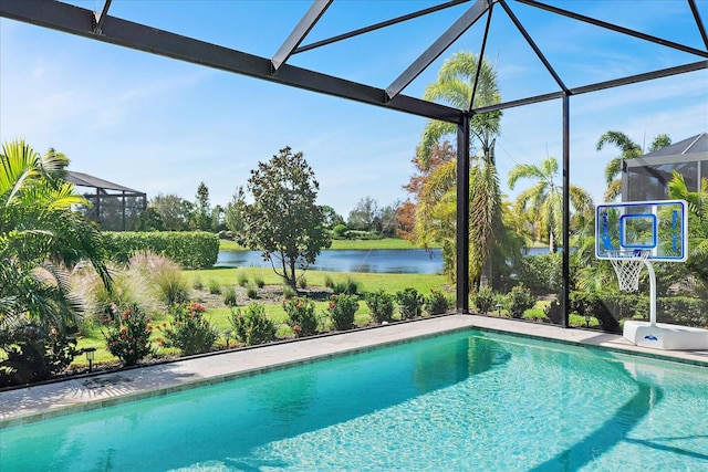 view of swimming pool with a water view and a lanai