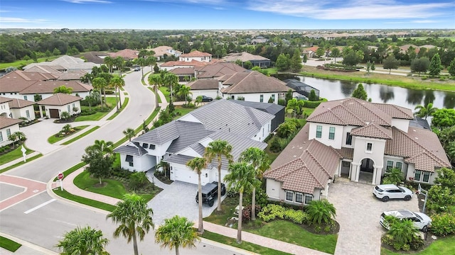 drone / aerial view featuring a water view