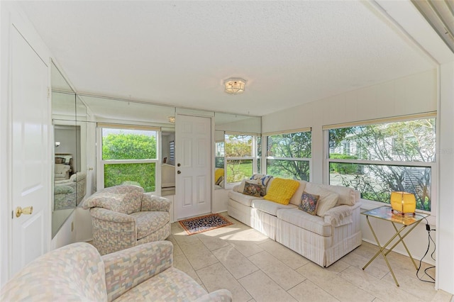 living room featuring a textured ceiling