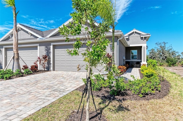 view of front of property featuring a garage