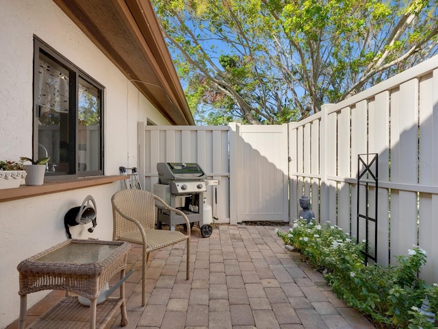 6417 Meadowlark Ln Unit 6417, Bradenton, FL 34210 - view of patio featuring area for grilling and fence