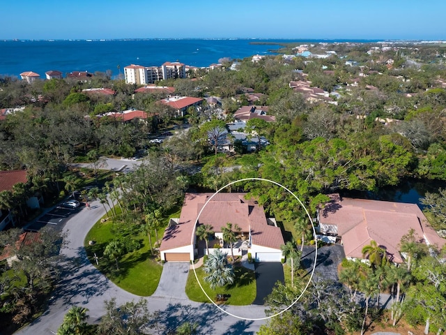 bird's eye view with a water view