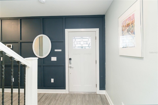 foyer with hardwood / wood-style flooring