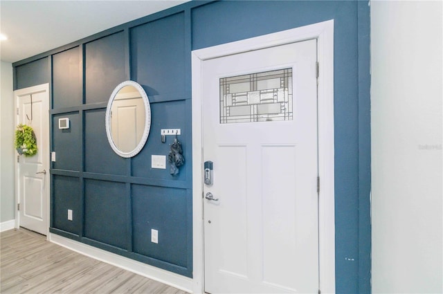 foyer entrance featuring wood-type flooring