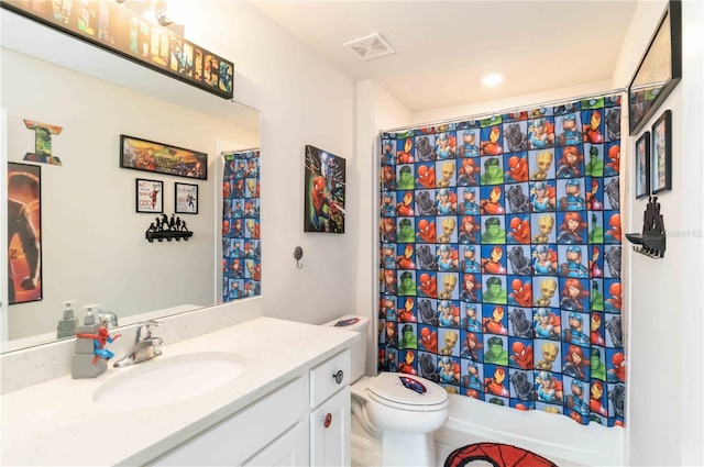 full bathroom featuring vanity, tile patterned flooring, toilet, and shower / bathtub combination with curtain