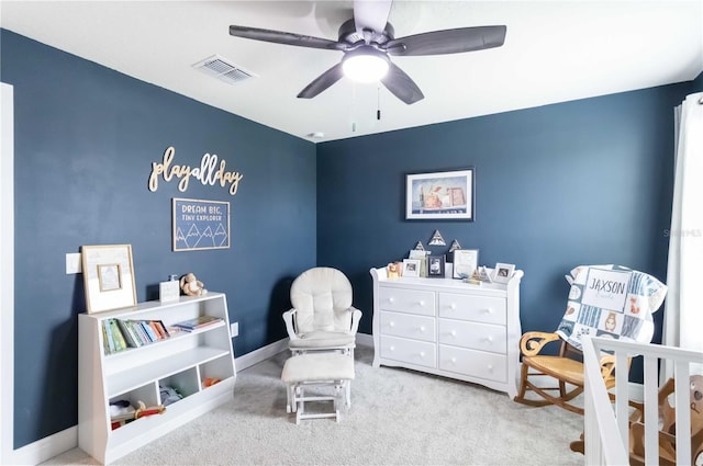 bedroom with light carpet and ceiling fan