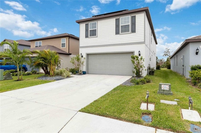 front of property with a front lawn and a garage