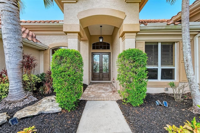 doorway to property with french doors