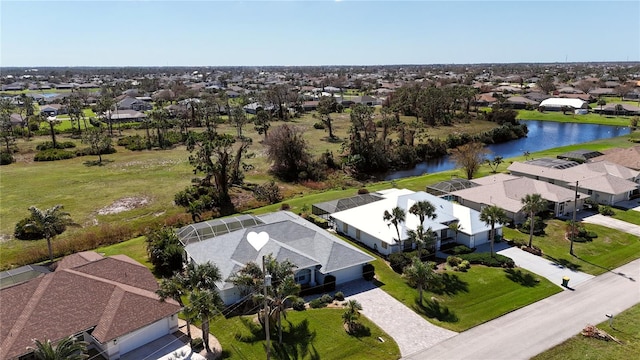 bird's eye view with a water view