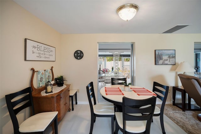 dining room featuring light tile patterned floors