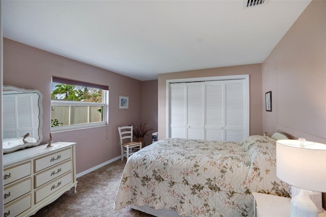 carpeted bedroom featuring a closet