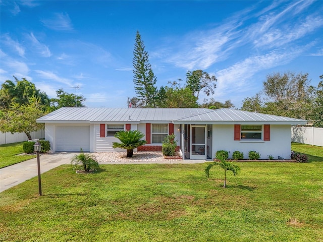 single story home with a front lawn and a garage