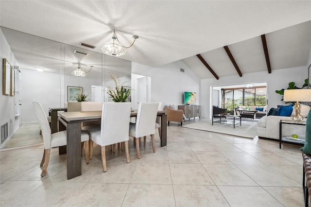 dining area featuring light tile patterned flooring, a textured ceiling, an inviting chandelier, and vaulted ceiling with beams