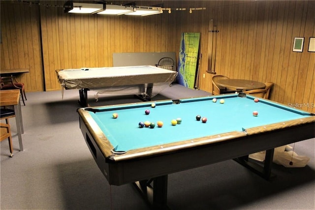 rec room with carpet flooring, billiards, and wood walls