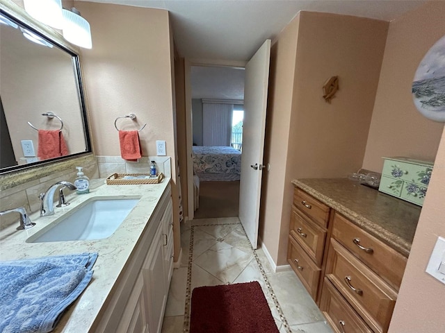 bathroom with vanity and backsplash