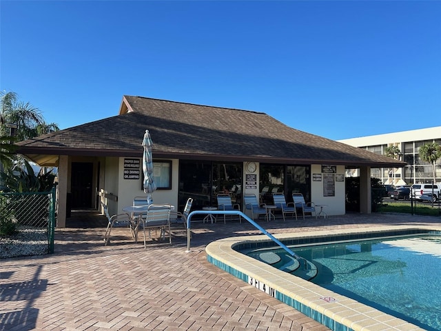 view of pool featuring a patio