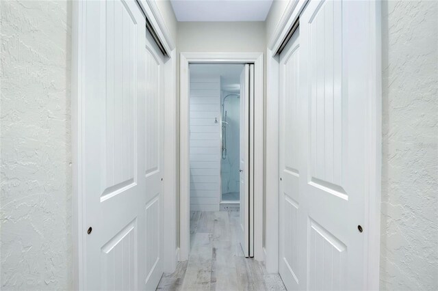 hallway featuring light hardwood / wood-style floors