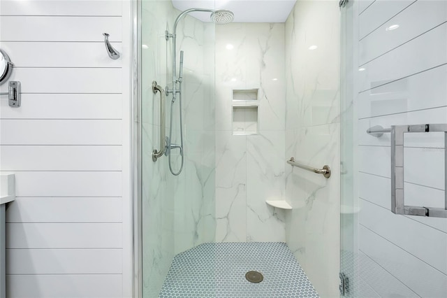 bathroom featuring an enclosed shower