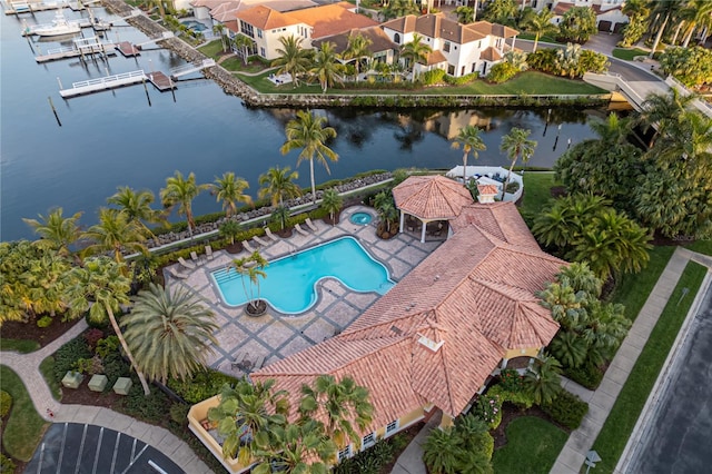 birds eye view of property featuring a water view