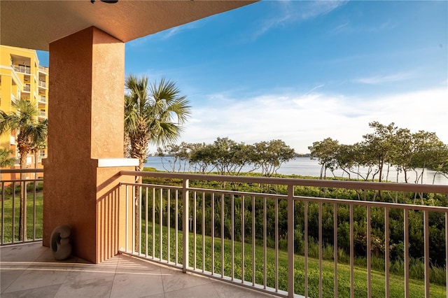 balcony featuring a water view