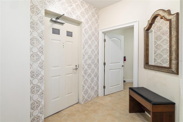 entryway featuring light tile patterned floors