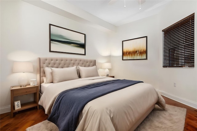 bedroom featuring dark wood-type flooring and ceiling fan