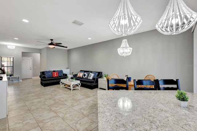 living room featuring ceiling fan