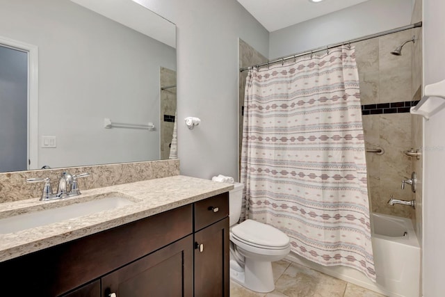 full bathroom featuring vanity, tile patterned flooring, toilet, and shower / tub combo