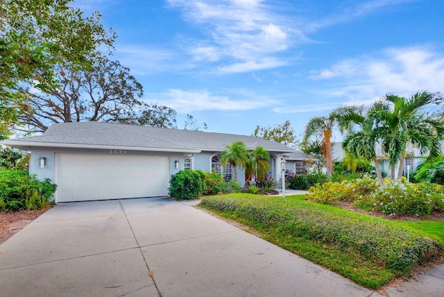 single story home featuring a garage