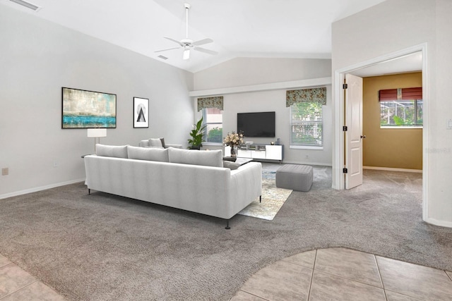 living room featuring light carpet, a healthy amount of sunlight, ceiling fan, and lofted ceiling