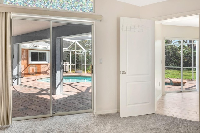 entryway featuring carpet floors