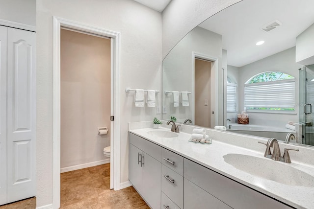 full bathroom featuring independent shower and bath, toilet, tile patterned flooring, and vanity