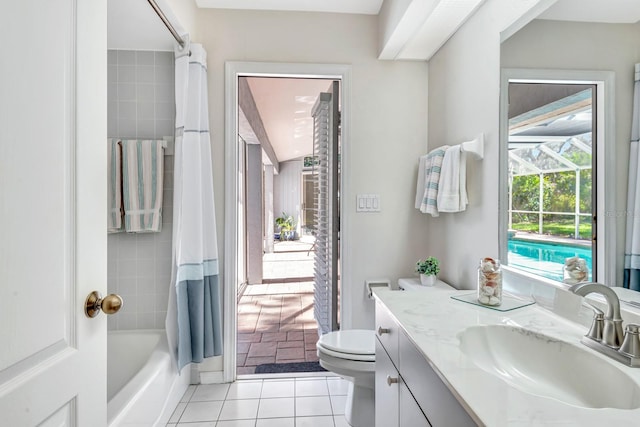 full bathroom featuring toilet, shower / bath combination with curtain, tile patterned floors, and vanity