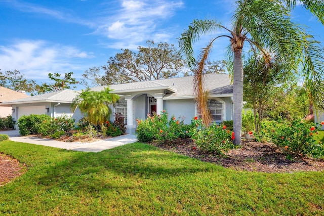 ranch-style house with a front lawn