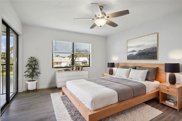 bedroom with dark hardwood / wood-style floors, access to exterior, and ceiling fan