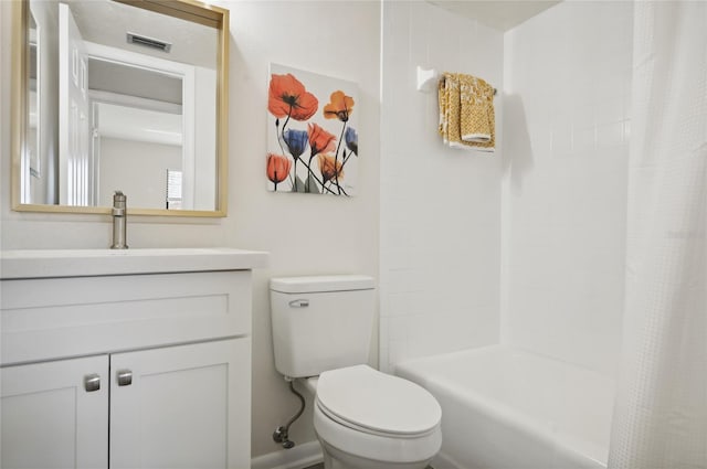 full bathroom featuring vanity, shower / bath combination with curtain, and toilet