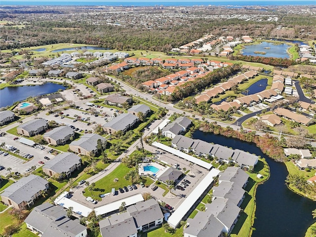 drone / aerial view with a water view