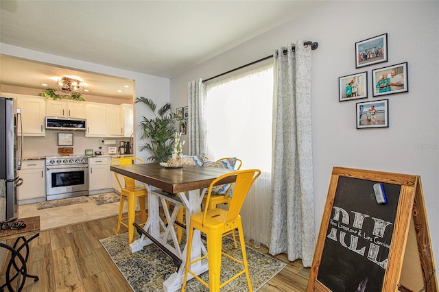 dining area featuring light hardwood / wood-style floors