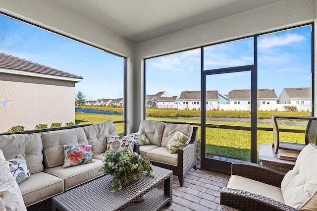 sunroom featuring a wealth of natural light